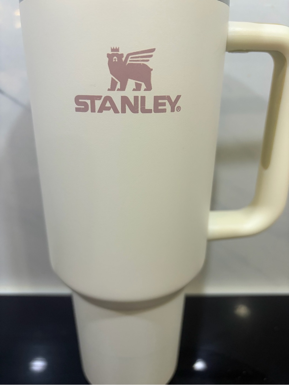 Stanley Cream Travel Mug with Pale Pink Logo and Handle